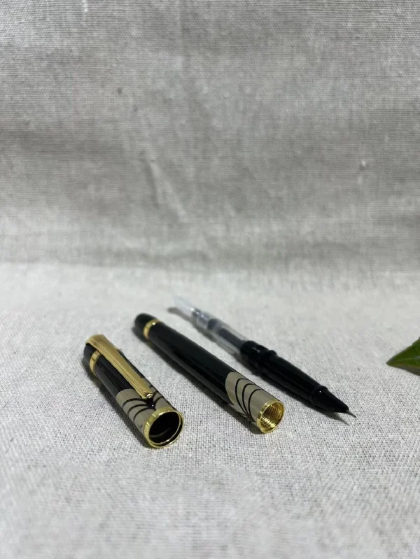 Φορητό μοντέρνο μαύρο χρυσό στυλό