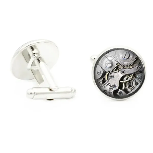 Silver cufflinks with a skeleton watch display